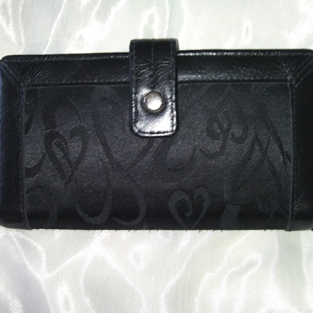 Black leather wallet with heart accents